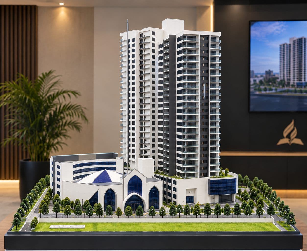 The scale model of the Crystal Fountain Cathedral and Centre, the sanctuary in front of the tower, on its plinth in the church lobby
